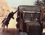 Indiana Jones jumping on the Nazi truck